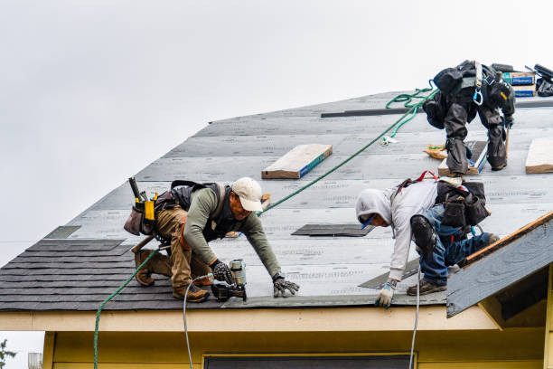 Professional Roofing technician working in Cutler, CA